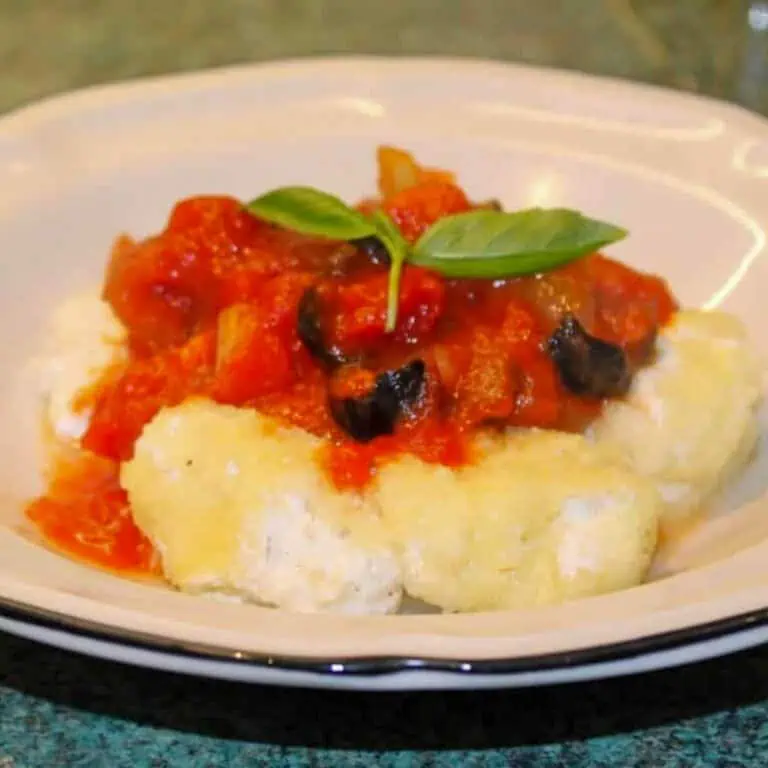 Homemade Gnudi with Tomato and Black Olive Sauce