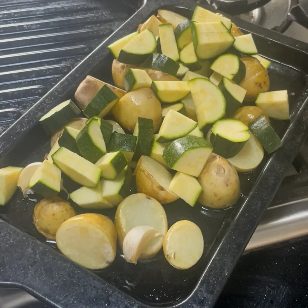 Seared tuna process shot 1 - roasting potatoes and courgettes