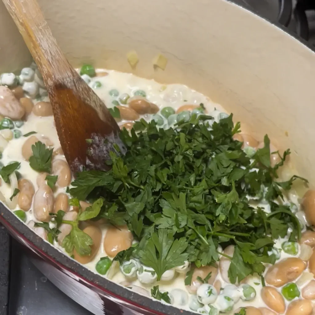 Creamy beans process shot 4 - finishing with chopped parsley