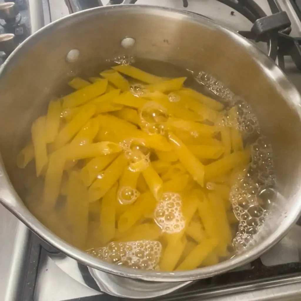 Process shot 1 - cooking pasta in a pot of boiling water
