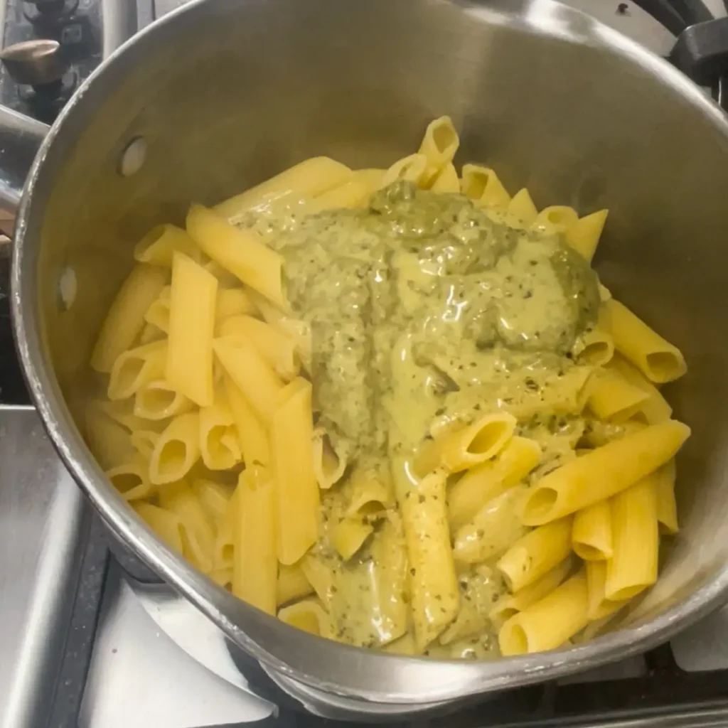 Process shot 2 - adding pesto to the pasta