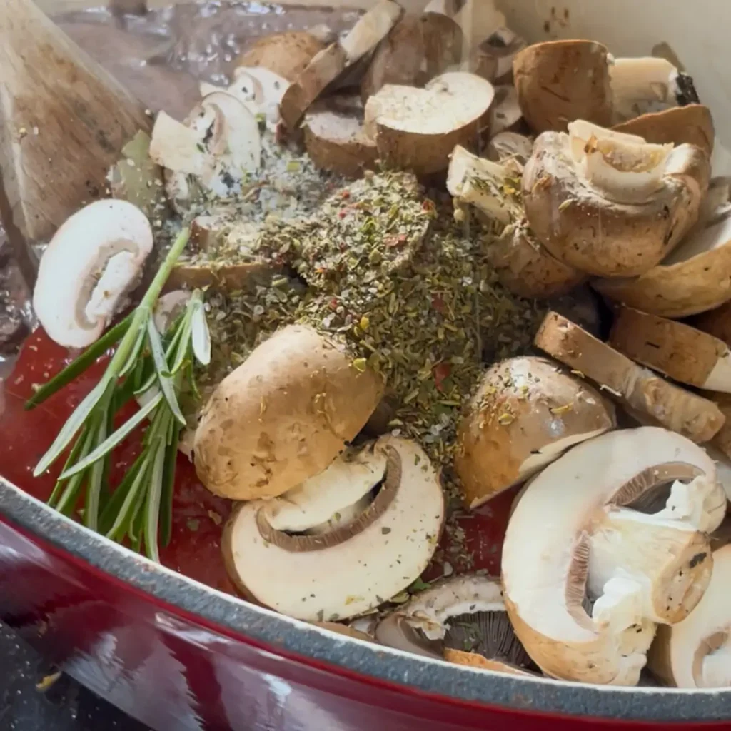 Bolognese pasta bake process shot 2 - adding the rest of the bolognese ingredients
