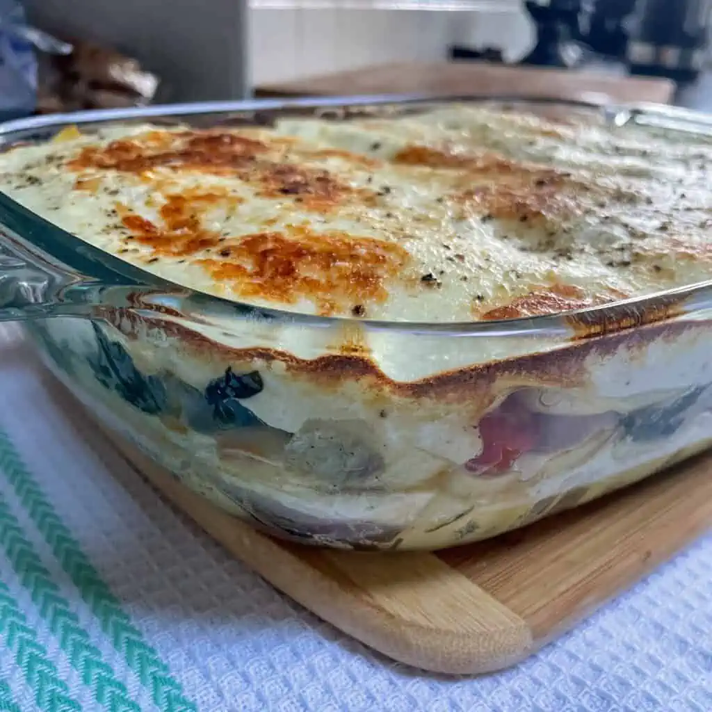 Spinach and ricotta lasagne baked until golden brown with bubbling top