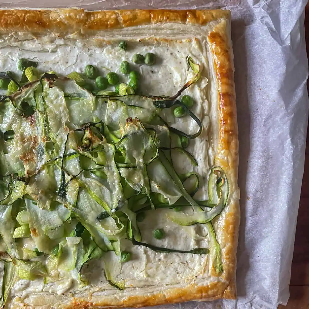 Simple Pea spring onion and courgette tart