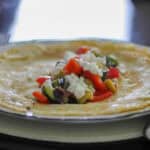 Mediterranean vegetable goats cheese savoury pancakes side view