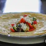 Mediterranean vegetable goats cheese savoury pancakes side view