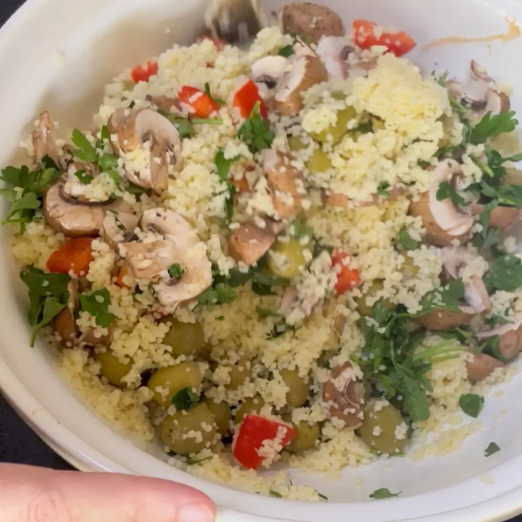 Process shot 3: mixing the vegetables into the couscous