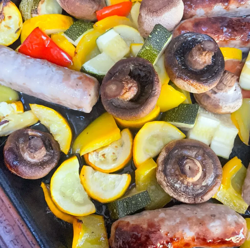 Sausage tray bake with hot honey glaze and courgettes and mushrooms