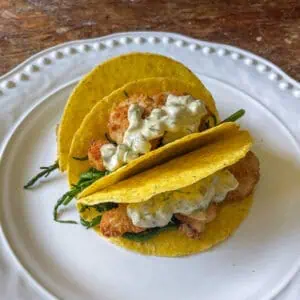 Scampi samphire and tartar tacos Side view