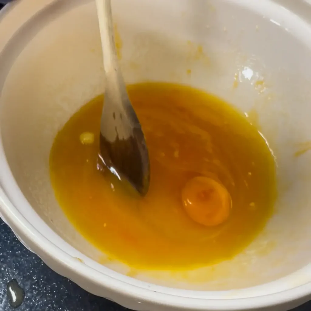 Blackberry loaf cake process shot 2 - adding the eggs