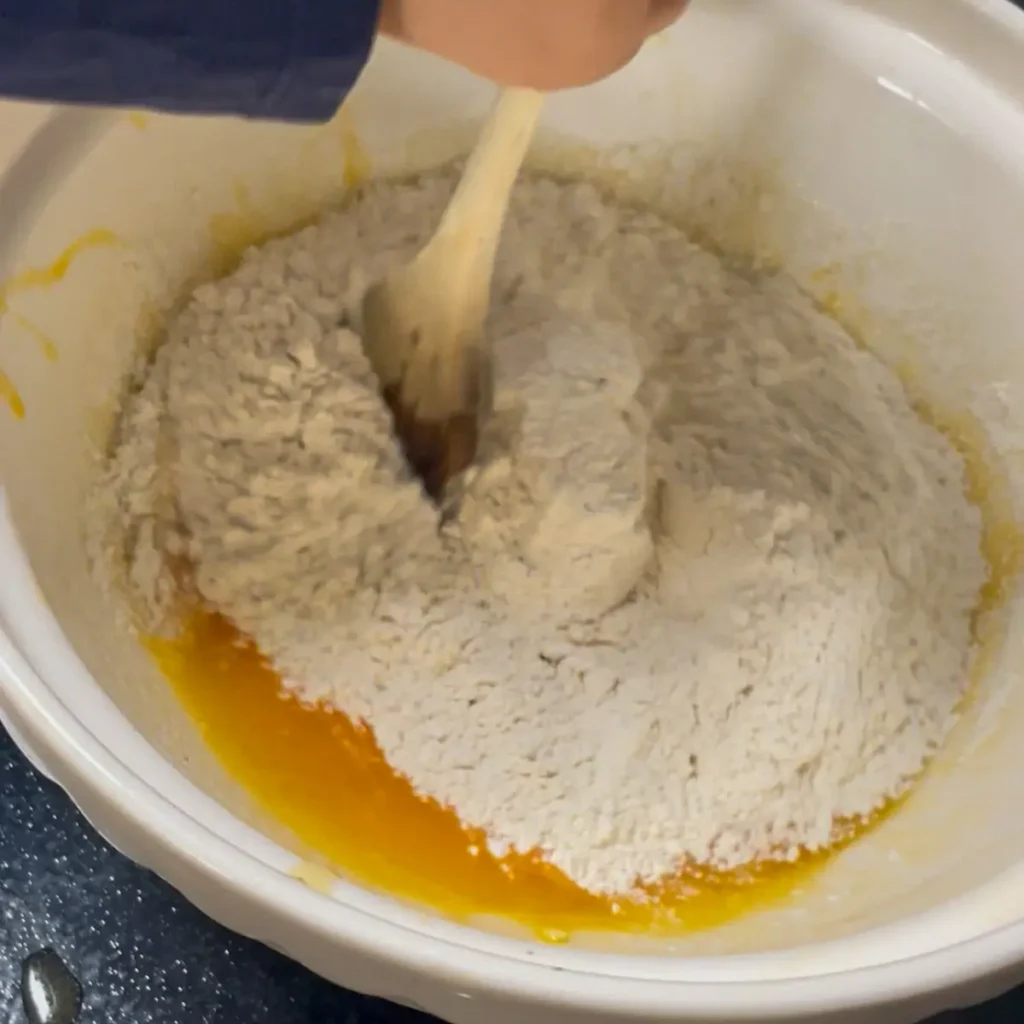 Blackberry loaf cake process shot 3 - adding the flour