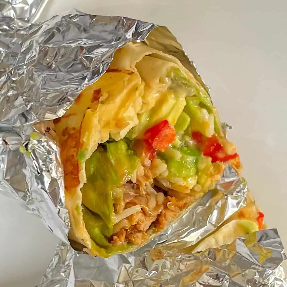 Slow cooker pulled chicken burrito