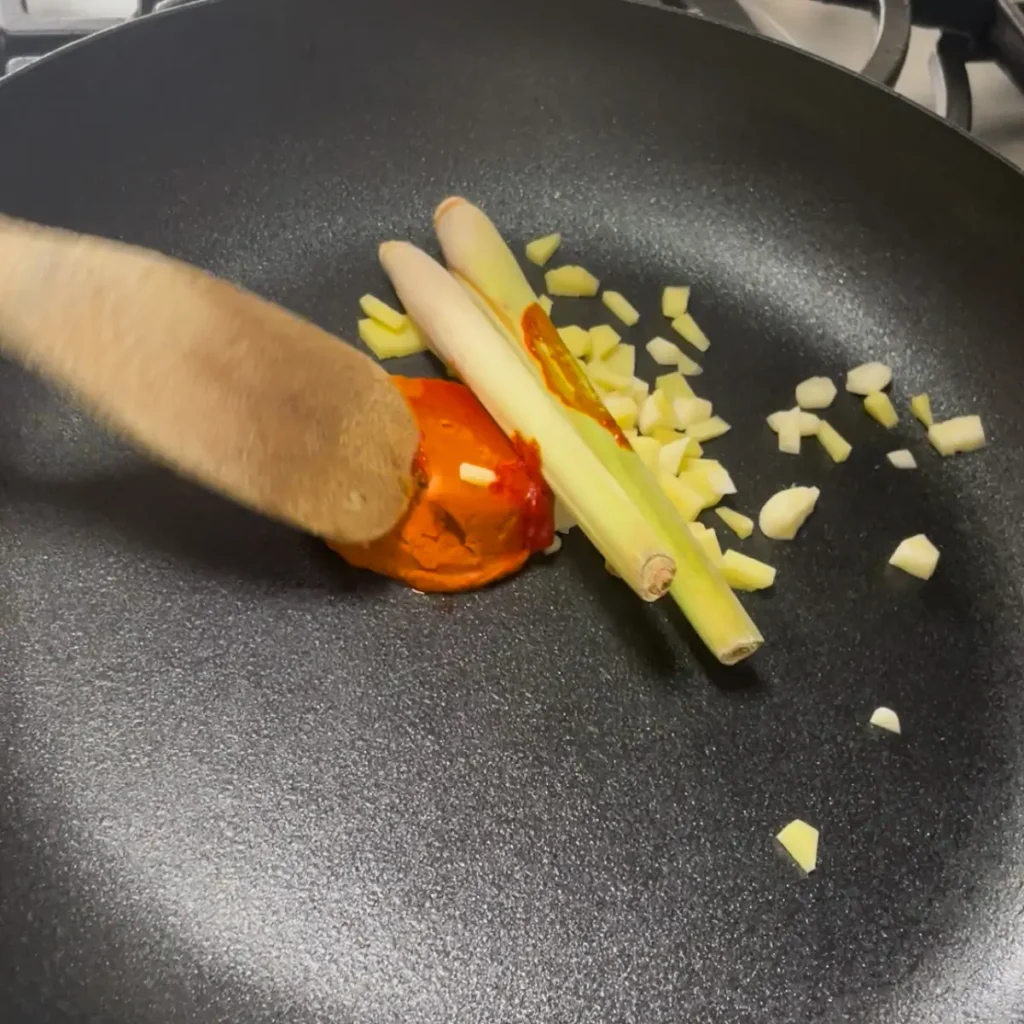 Process shot 1 - cooking lemongrass, garlic, ginger, curry paste