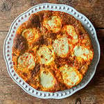 Frittata with chorizo and mozzarella on a white plate