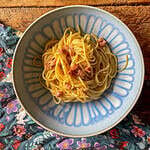 Homemade Spaghetti carbonara in a blue and white bowl