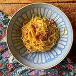 Homemade Spaghetti carbonara in a blue and white bowl