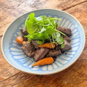 Warm beef and lentil salad with carrots