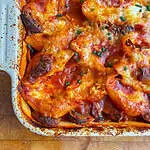 Goats cheese stuffed shells Topped with sliced chives