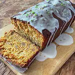 Lime and ginger loaf cake with a slice cut