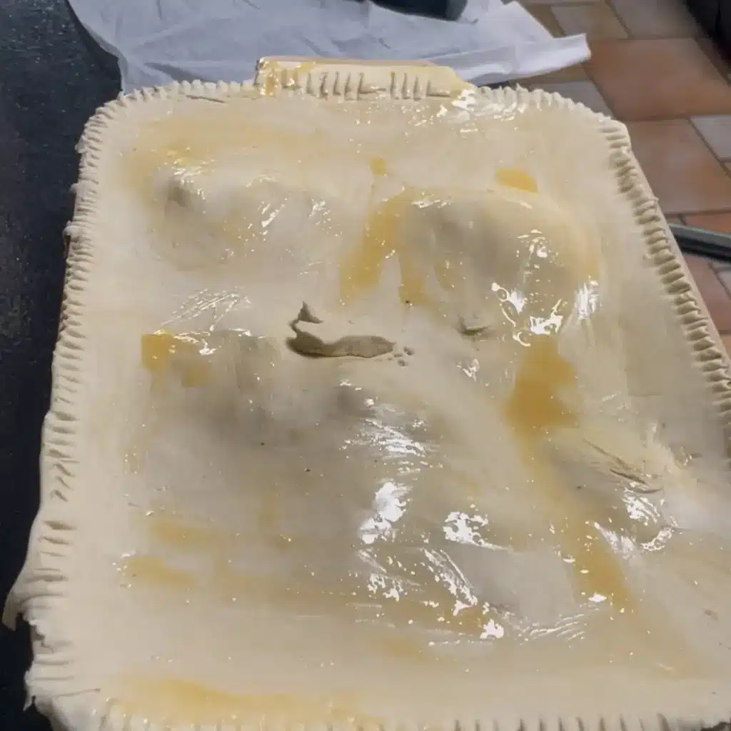 Cooking coq au vin pie - Putting the pastry on top