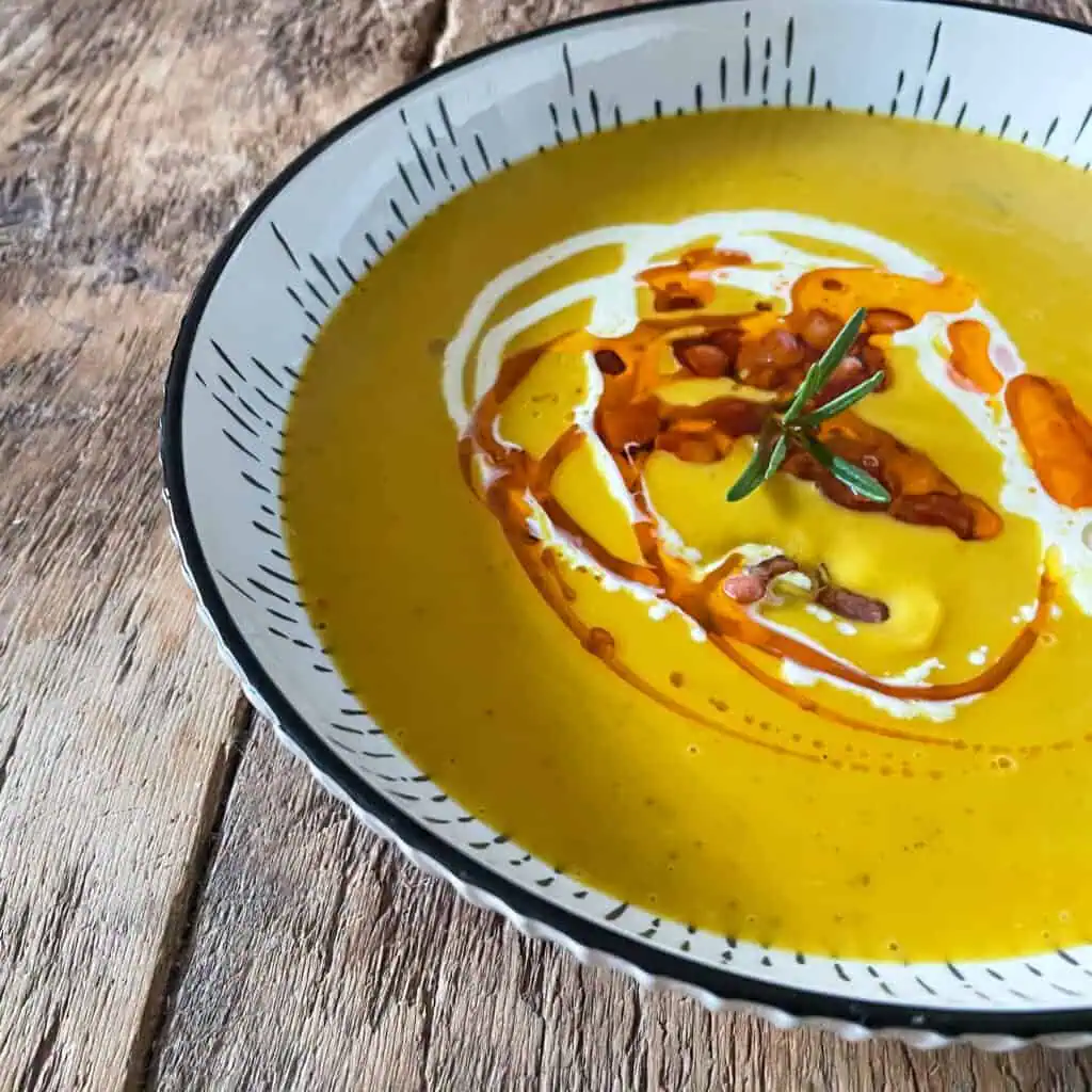 Easy roasted squash soup topped with crisp pancetta and chilli oil