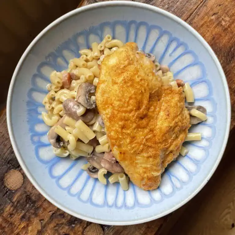 Tender chicken schnitzel with creamy mushroom pasta