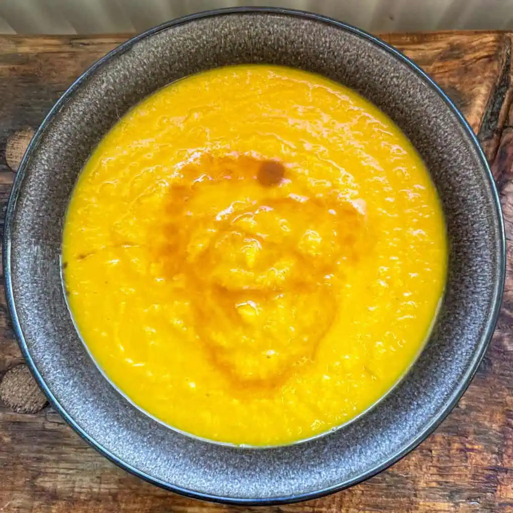 Carrot and ginger soup topped with hot honey