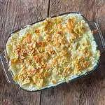 Beef chilli pie topped with cheesy nachos