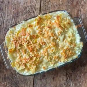 Beef chilli pie topped with cheesy nachos