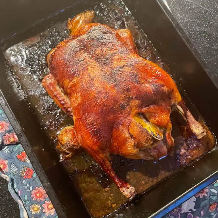 Crispy-skinned roast duck with brandy and honey glaze, ideal for holiday entertaining