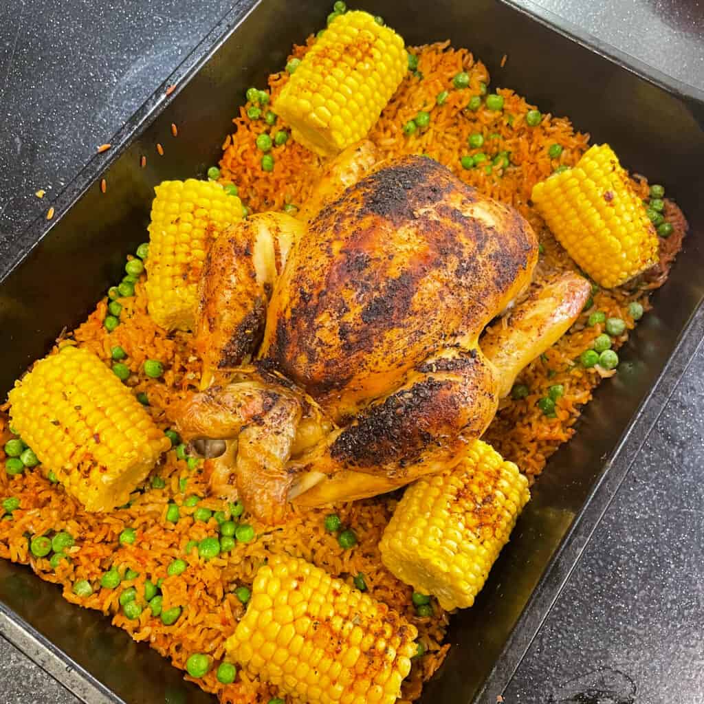 peri peri roast chicken with corn on the cob and rice made in one pan