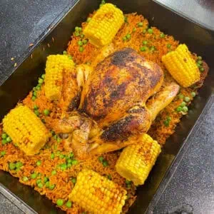 peri peri roast chicken with corn on the cob and rice made in one pan