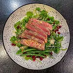 15 minute steak and green bean salad in a white bowl