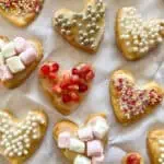 Homemade heart cookies for Valentine’s Day with a selection of toppings