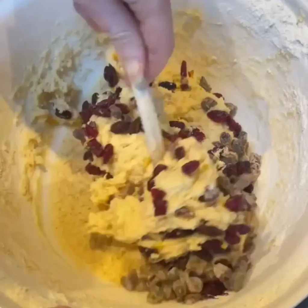 Process shot 4 - adding lemon zest and sultanas