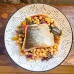 Crispy pan-fried salmon with sautéed rainbow chard and chickpeas – easy weeknight fish recipe idea.