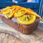 orange and honey loaf cake with glossy candied orange topping – sweet and fragrant homemade cake recipe.