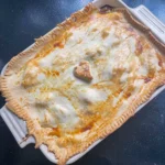 Pie with beef and ale and cauliflower cheese