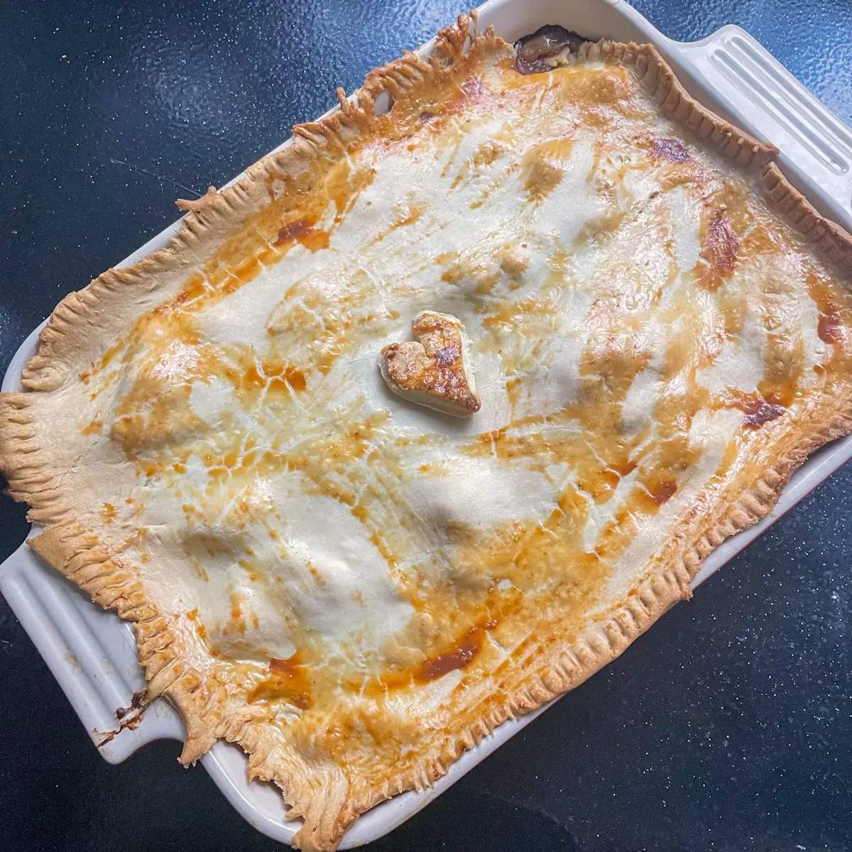 Pie with beef and ale and cauliflower cheese