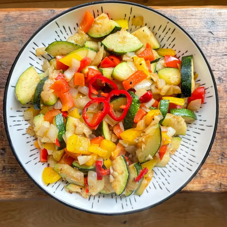 salt and pepper flavoured courgettes in a white bowl