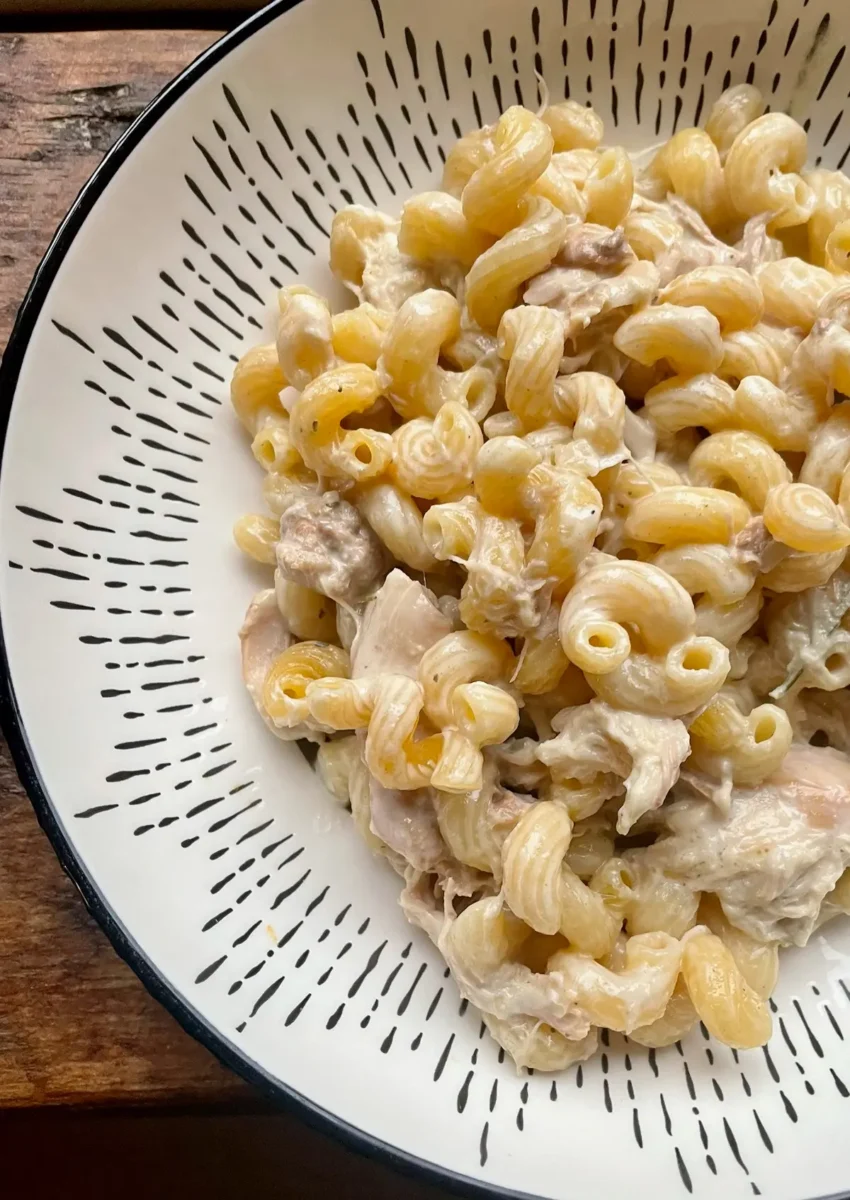 creamy slow cooker chicken pasta in a white bowl