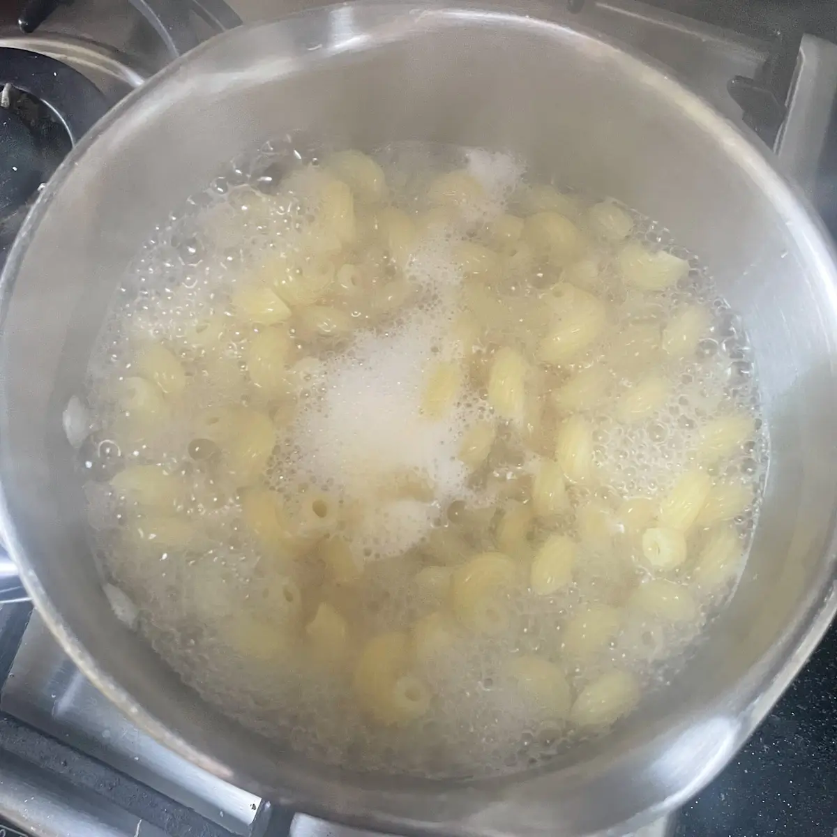 pasta cooking in boiling water