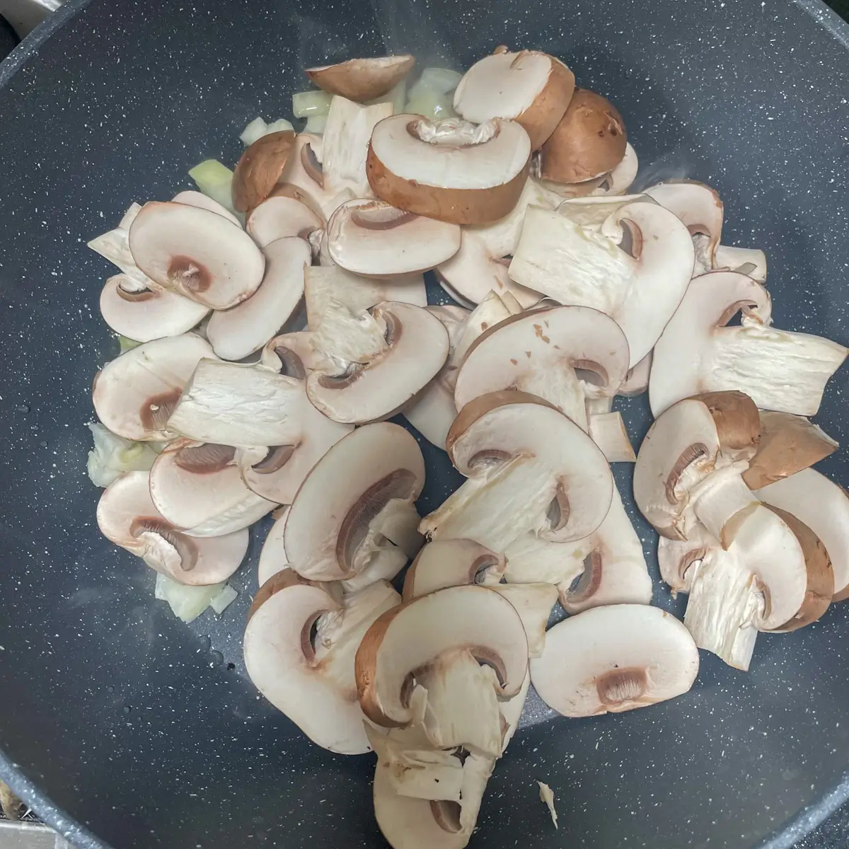 cooking the onions and mushrooms