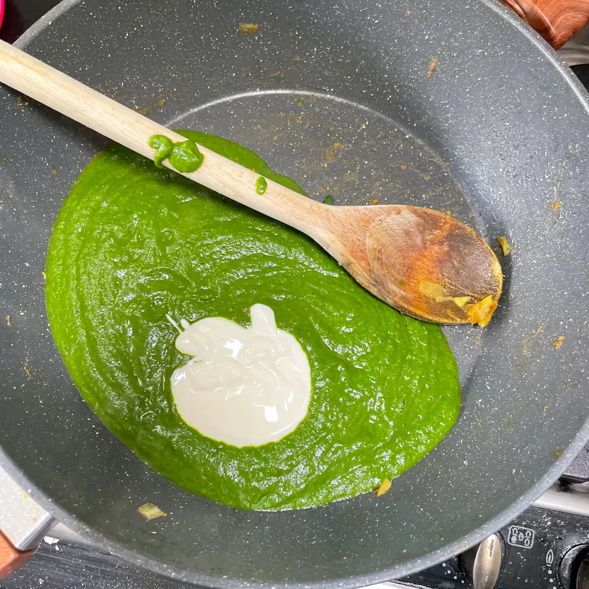 Adding yoghurt to the blended sauce