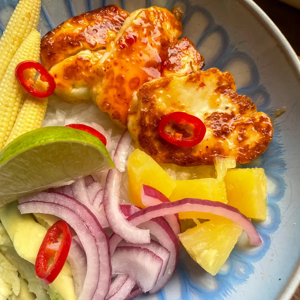 golden sweet chilli halloumi in a rice bowl