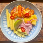 rice bowl with hallumi, sweetcorn, pickled onions and pineapple
